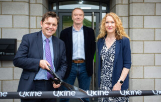 Catherine Elton and Jim Warwick from Qkine pictured with Mayor Dr Nik Johnson on opening day